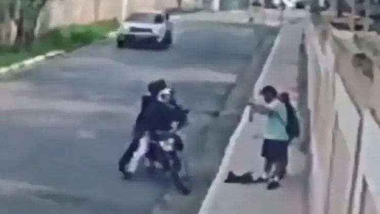 Bike riders were robbing a young man in the middle of the road, then a car coming from behind did this, watch the video