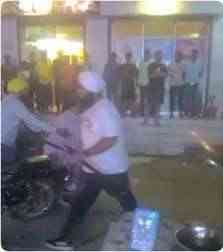 There was a collision between cars, then tourists created a ruckus, a girl waved a sword and got injured