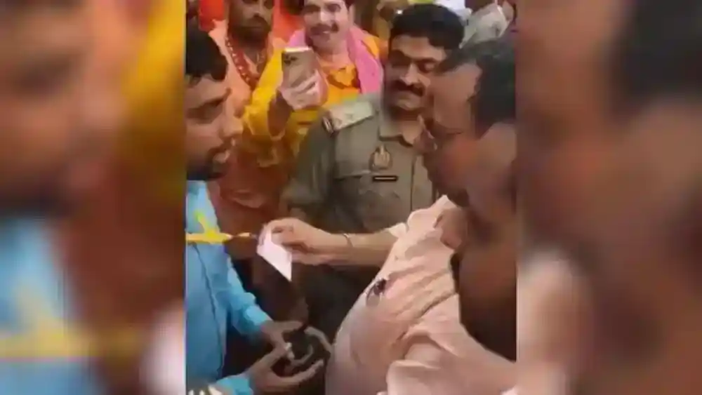 Sector Magistrate reached the main gate of the temple wearing shoes, anger spread among the people