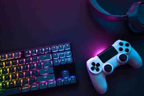 Pi7compressedtop down view of colorful illuminated gaming accessories laying on table