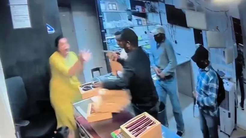 Woman Jewelry Shop Owner Jumps Over Counter to Chase Away 6 Armed Robbers